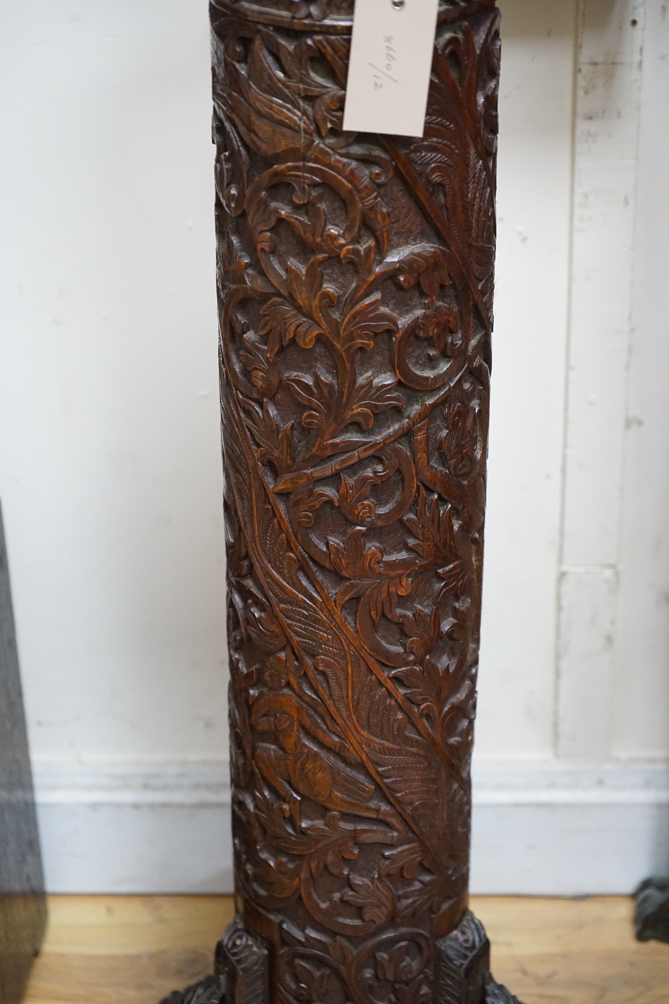 A late 19th century Burmese carved bamboo and wood stand, 84.5 cm high